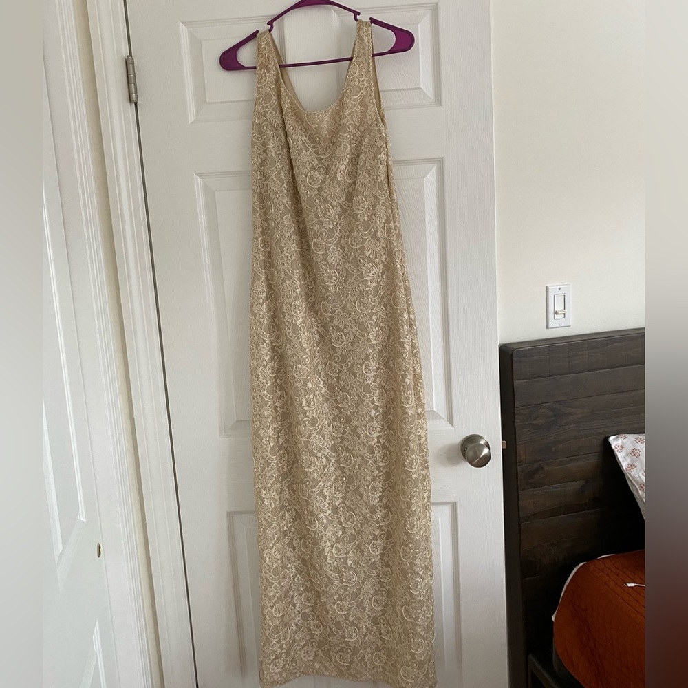 Vintage champagne colored,beautifully beaded gown, fits sizes 2-6. Send offers